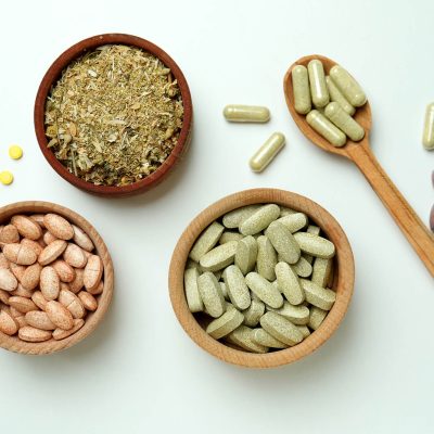 concept-of-herbal-medicine-pills-on-white-backgrou-USUTMBV